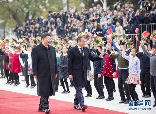 习近平与马克龙在北京会面，共商互联网发展大计